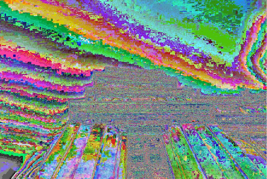 A vibrant, abstract image from converting Street View screenshots from TIFF to JPEG, showing a pixelated, distorted classical building with columns. The sky features glitch-like, multicolored waves, blending greens, purples, pinks, and blues.