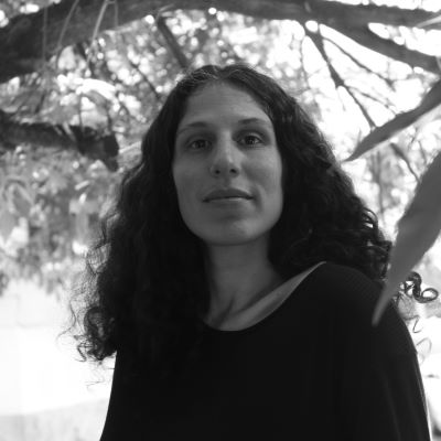 Black and white headshot of Julieta. 